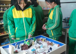 杭州特训学校心理辅导特色课程-团体沙盘游戏